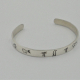 Front view of sterling silver Ohio Petroglyph cuff bracelet