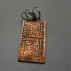 frot view of star brick full brick copper and sterling silver pendant