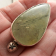 tourmamlinated prehnite ring on hand for size comparison