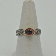 Front view of pink tourmaline gold and silver handmade ring